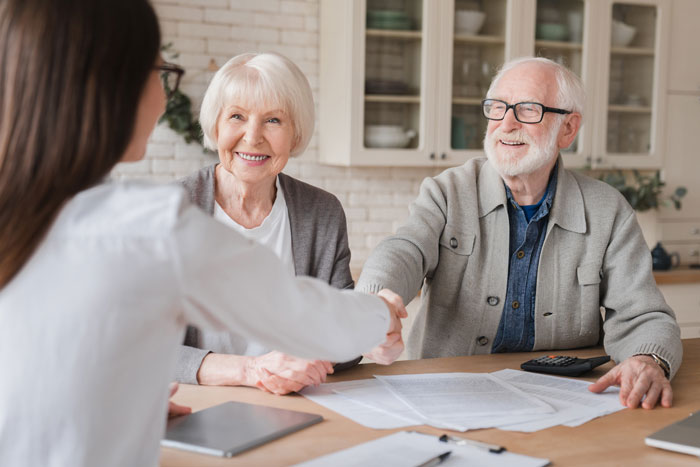 DANC-happy-old-elderly-senior-grandparents-family-couple-clients-signs-contracts happy-old-elderly-senior-grandparents-family-couple-clients-signs-contracts